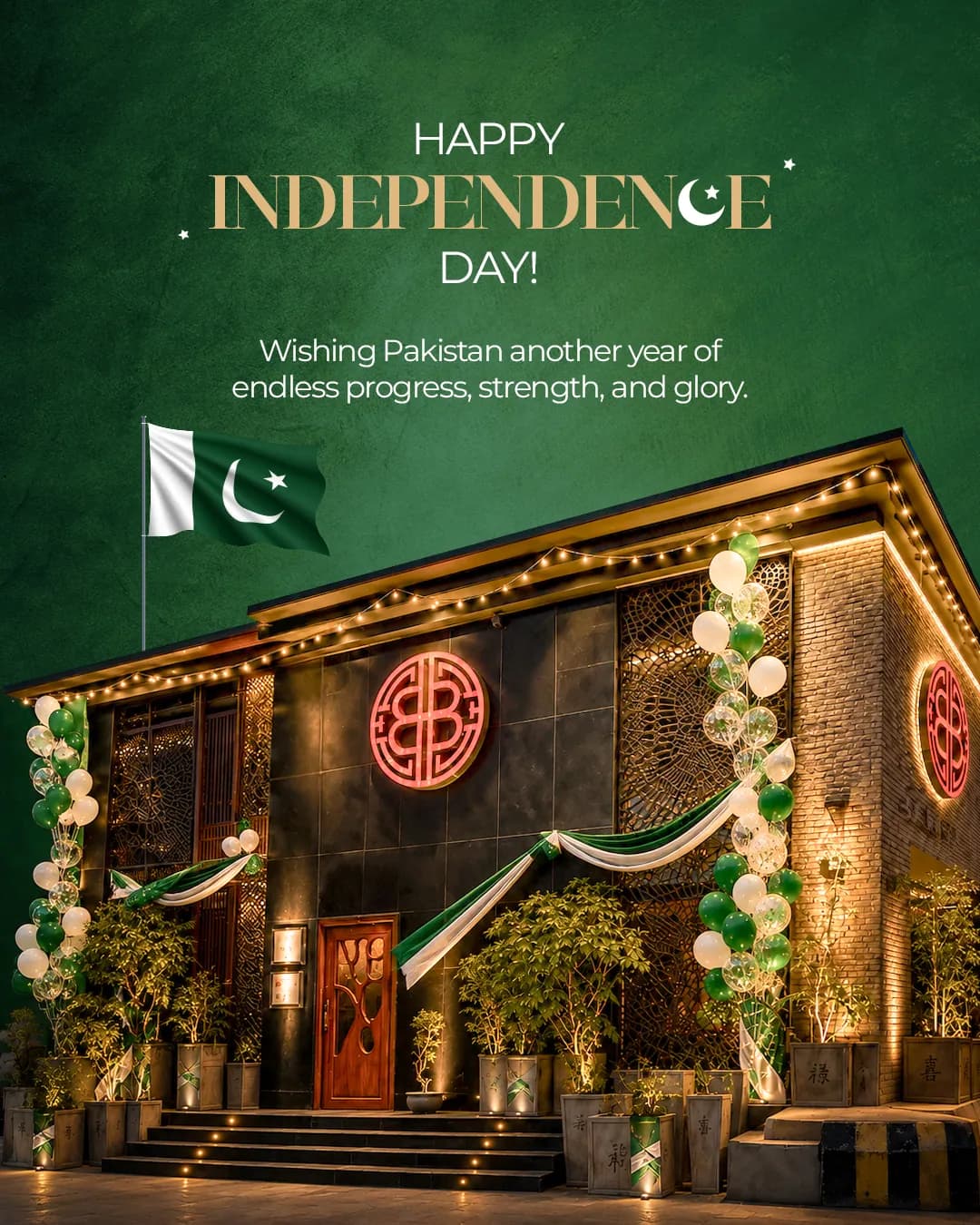 The Bam-Bou restaurant front lit at night with Pakistan flags, under the words Happy Independence Day