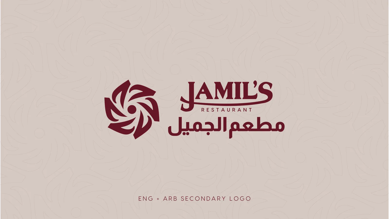 The Jamil's Restaurant logo, a maroon rosette beside the name in English and in Arabic, on a pale stone ground