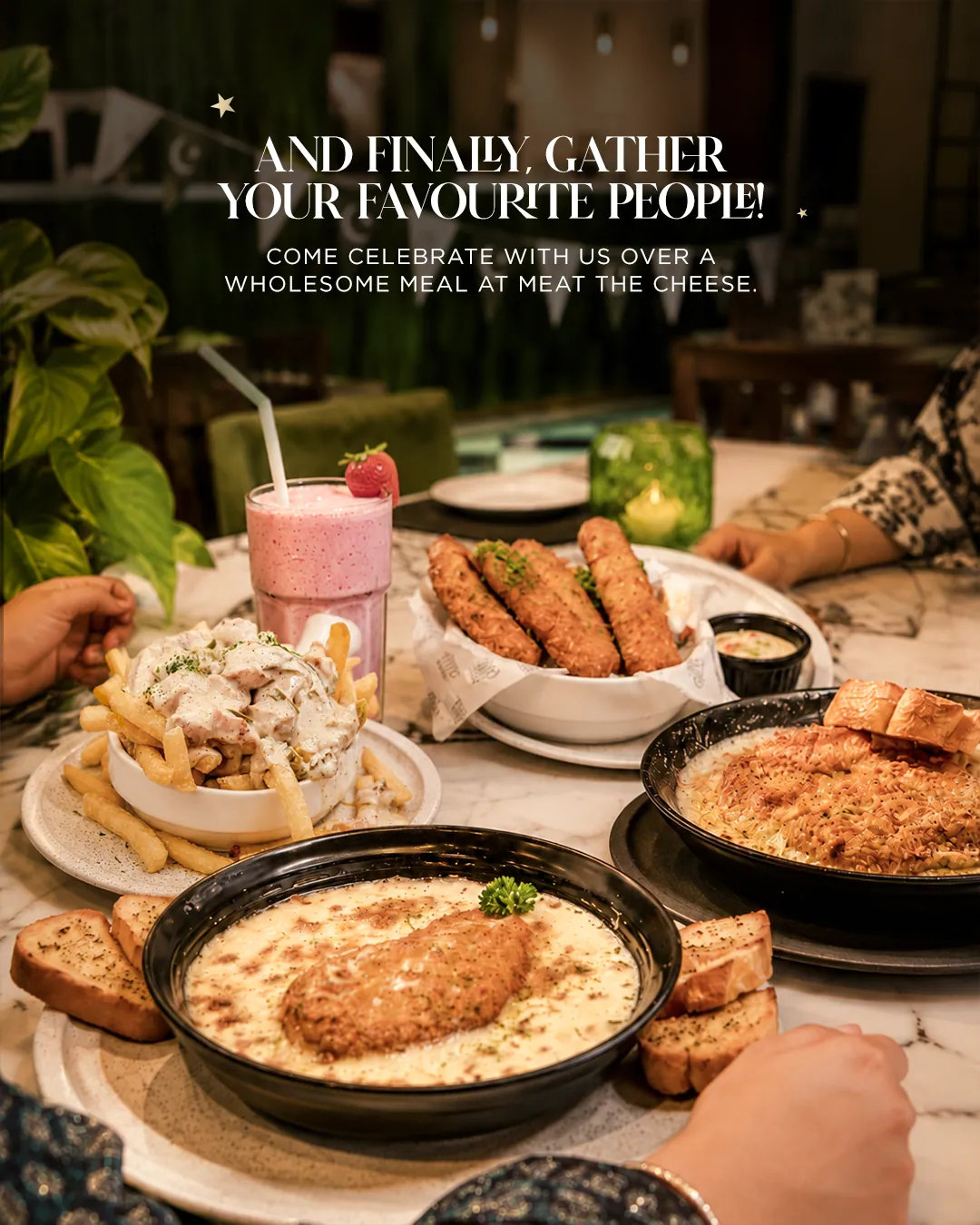 A table of steaks, pasta, fries and a milkshake, under the words And finally, gather your favourite people