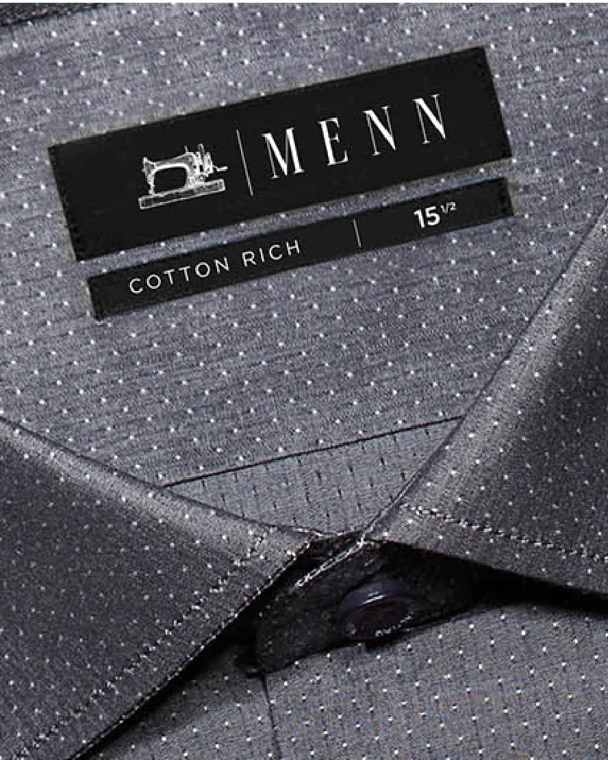 A black MENN label with the sewing-machine logo, sewn into a grey shirt collar